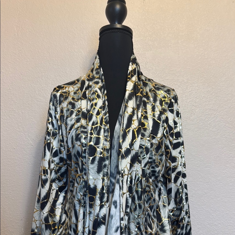 Elegant Women's Black and Gold Patterned Top